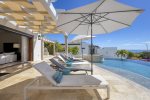 Relaxing pool chairs with shade
